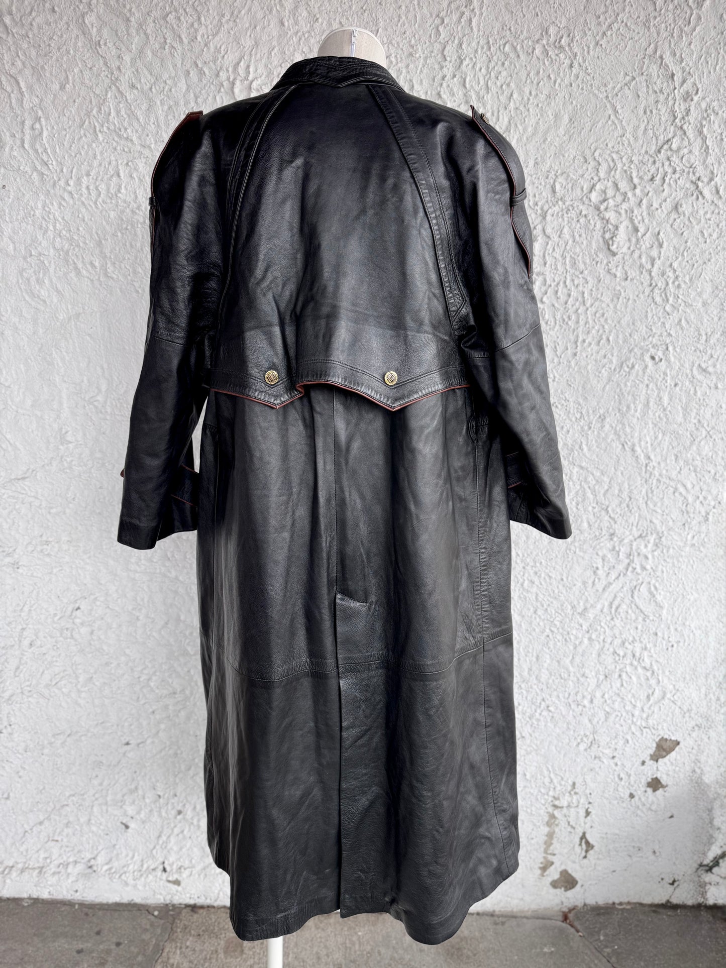1980s vintage black leather coat • draco