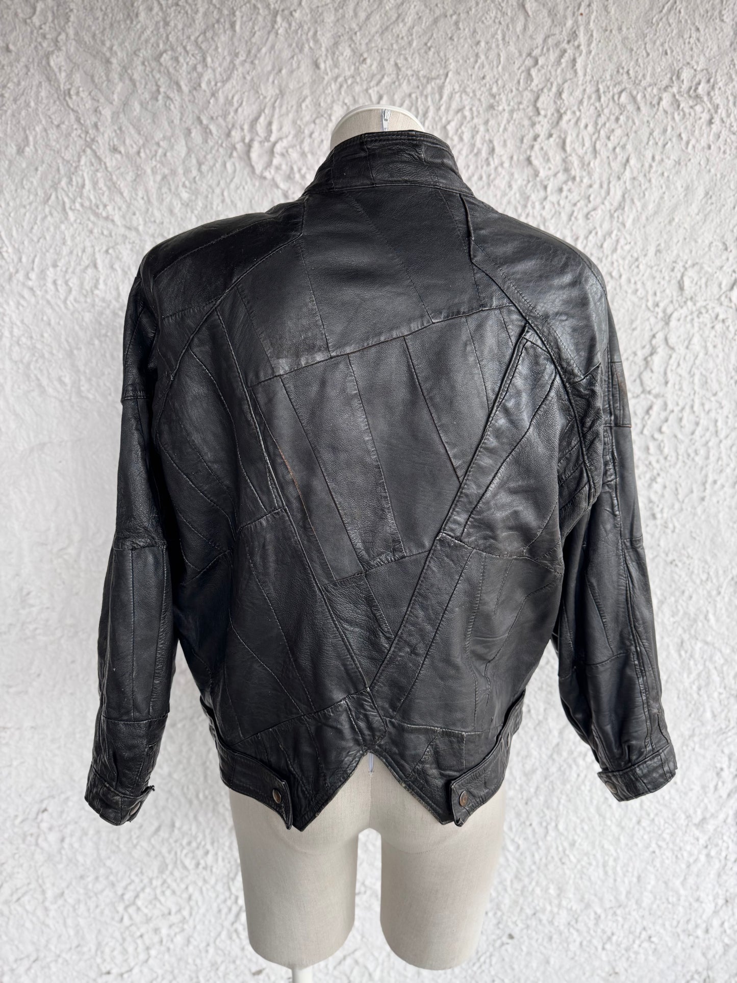 1980s vintage black patchwork leather jacket • esra