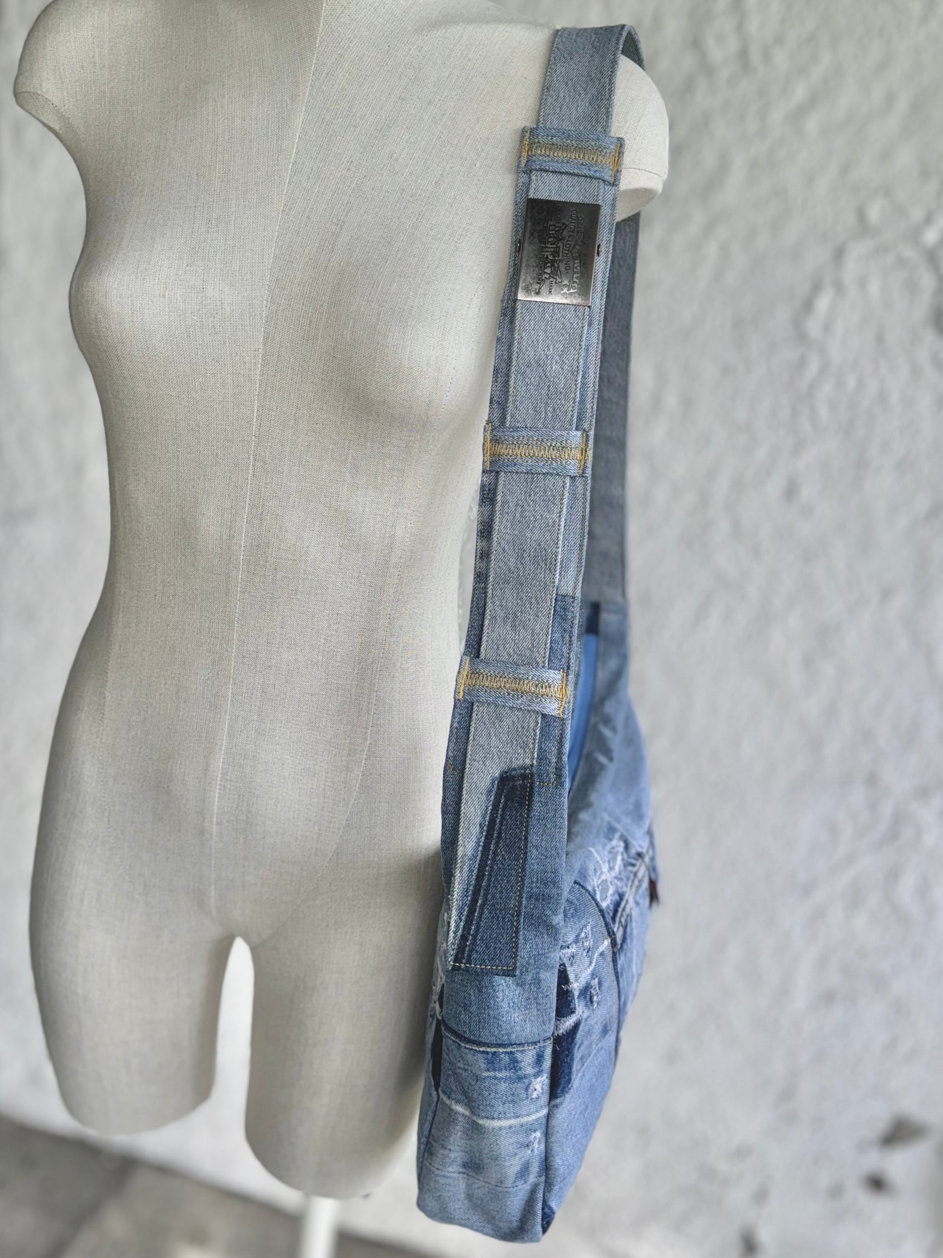  upcycled light blue denim laptop bag with a levi's buckle by KIOKU Studio