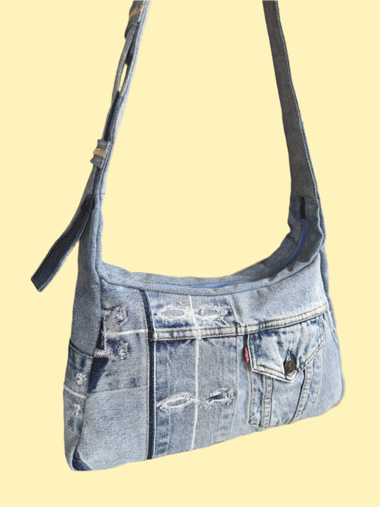  upcycled light blue denim laptop bag with a levi's buckle by KIOKU Studio