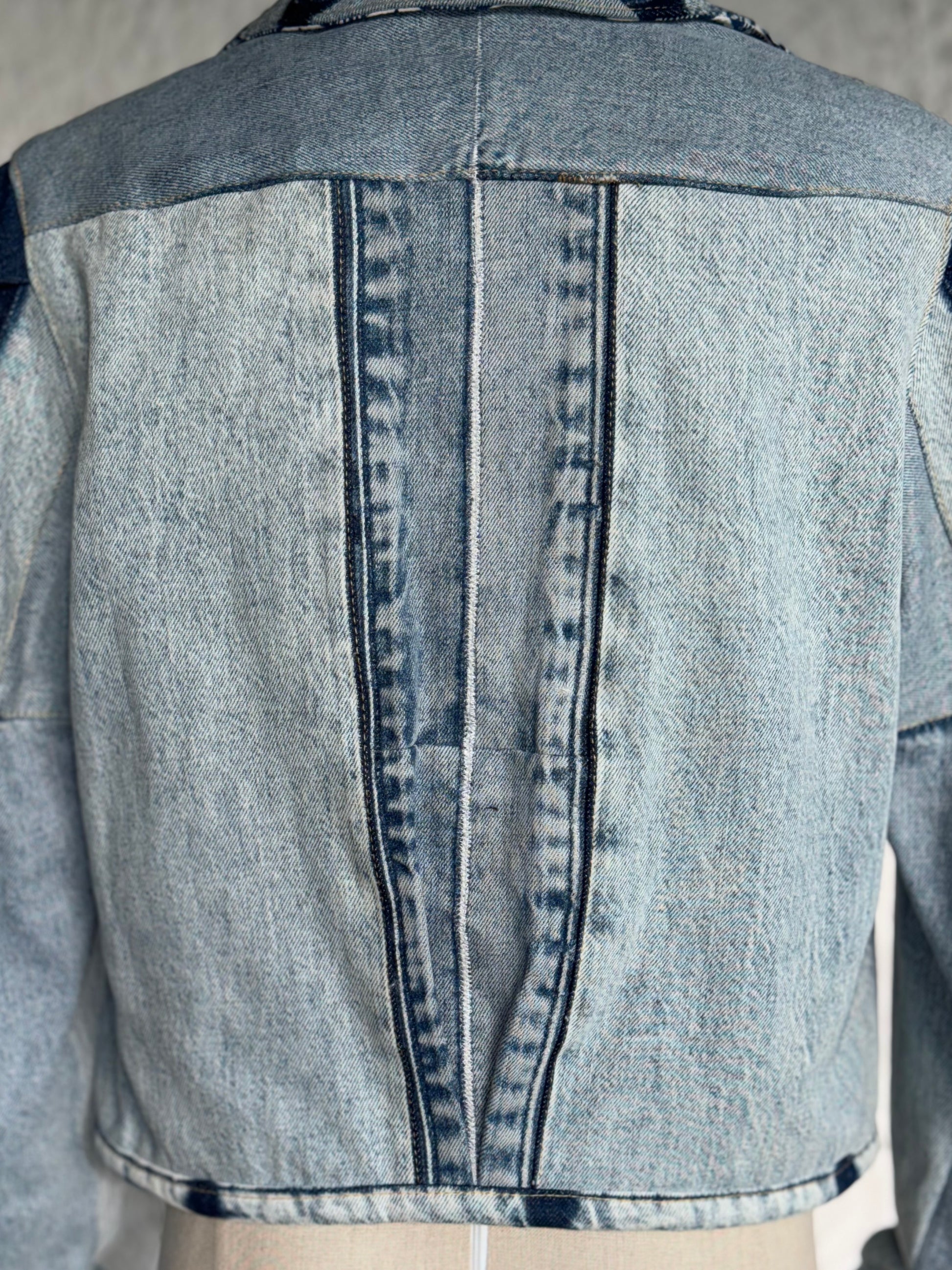 cropped patched denim jacket by KIOKU Studio back detail close up