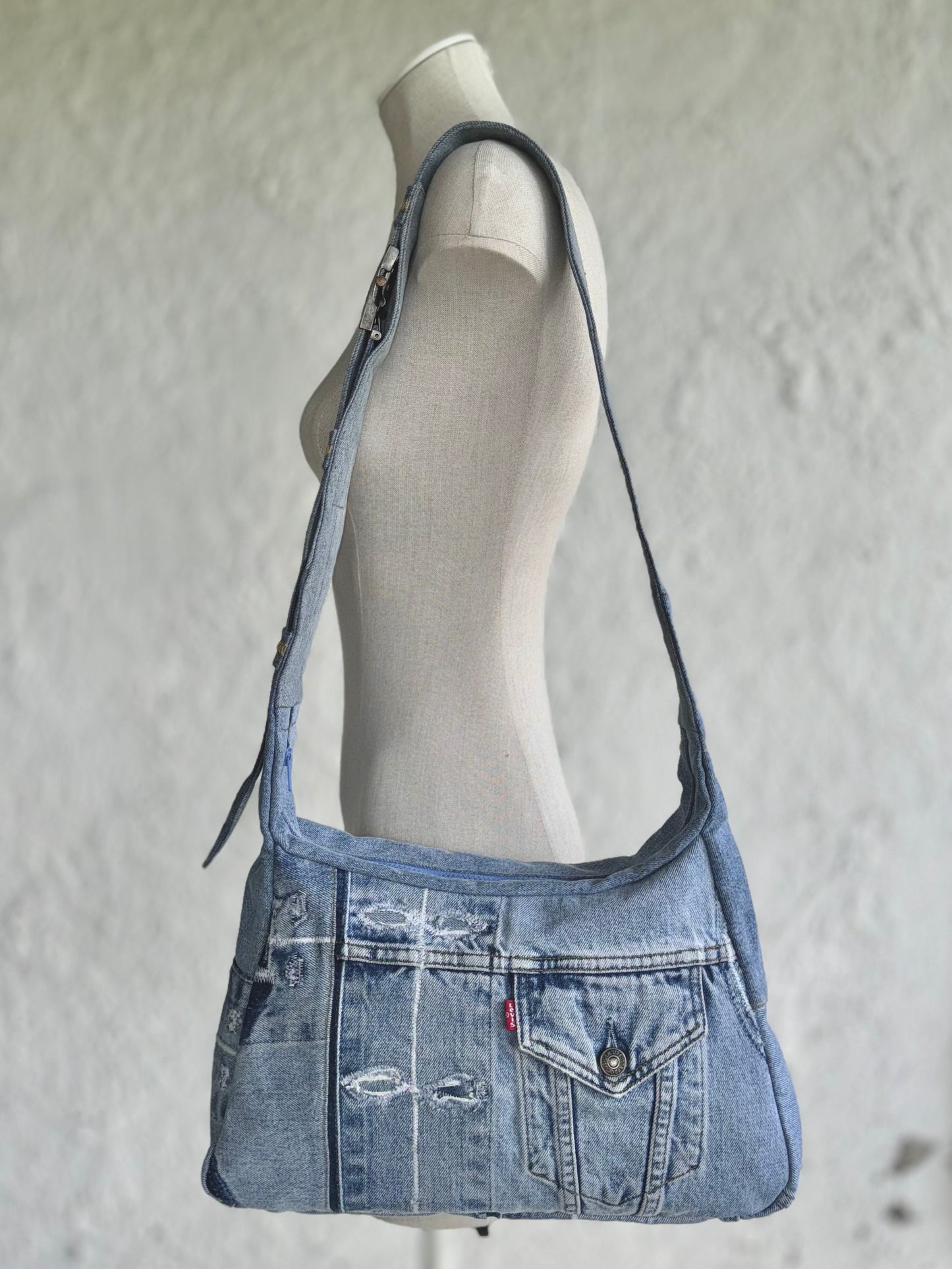  upcycled light blue denim laptop bag with a levi's buckle by KIOKU Studio