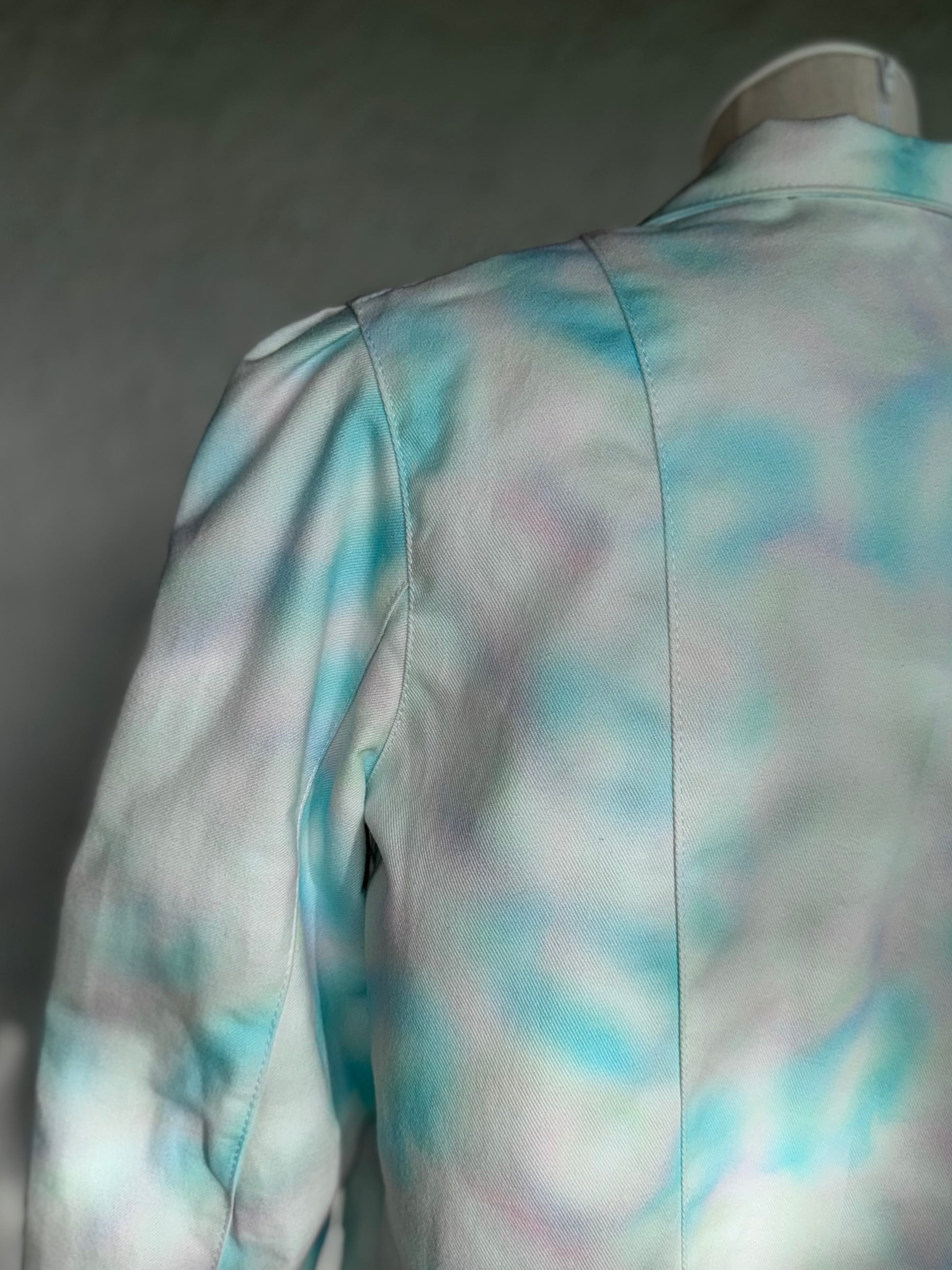 aqua blue spotted white denim jacket by KIOKU Studio close up