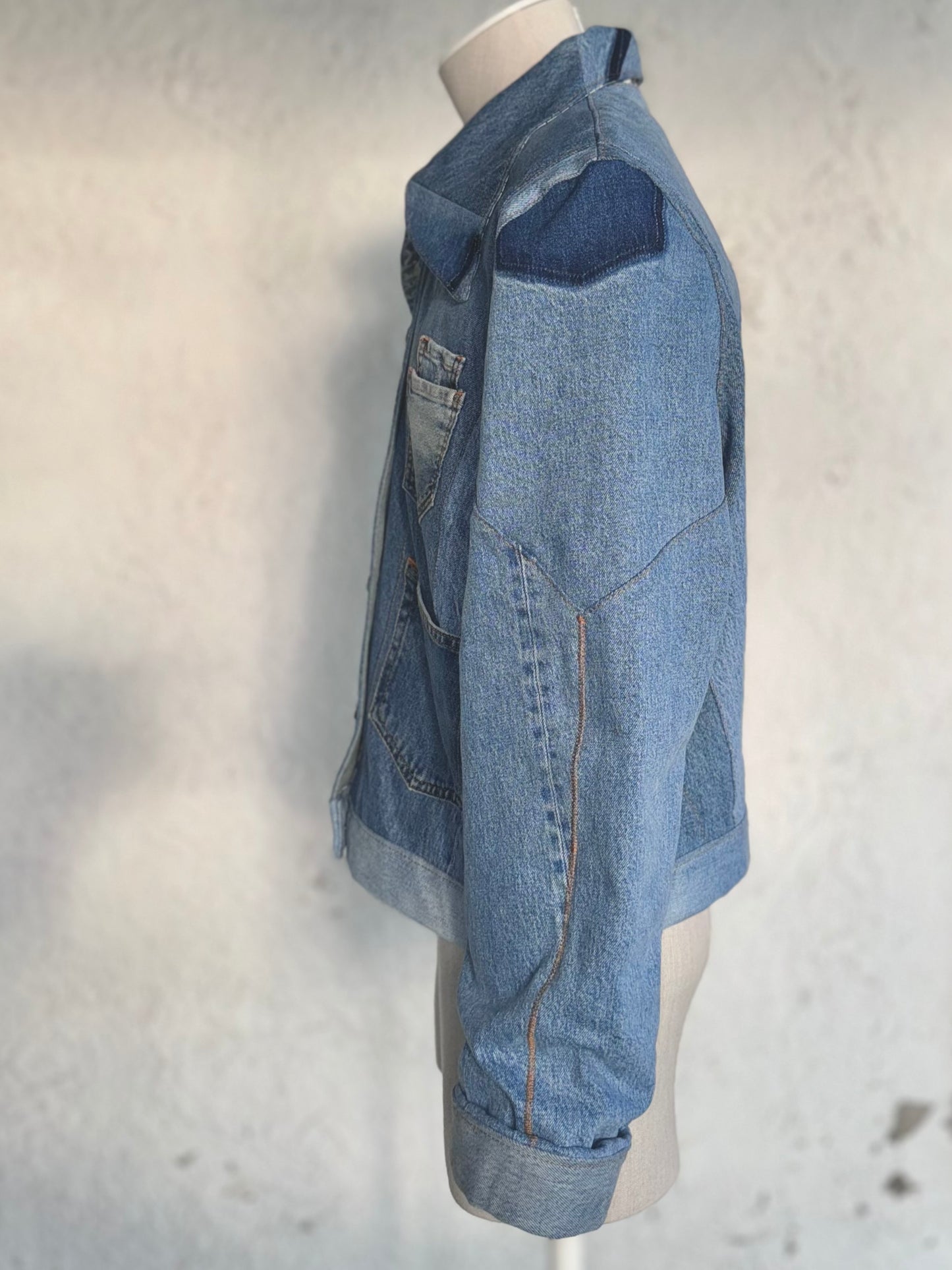 One of a kind blue denim jacket by KIOKU Studio sleeve detail