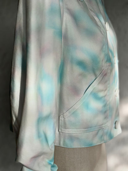 aqua blue spotted white denim jacket by KIOKU Studio pocket detail close up