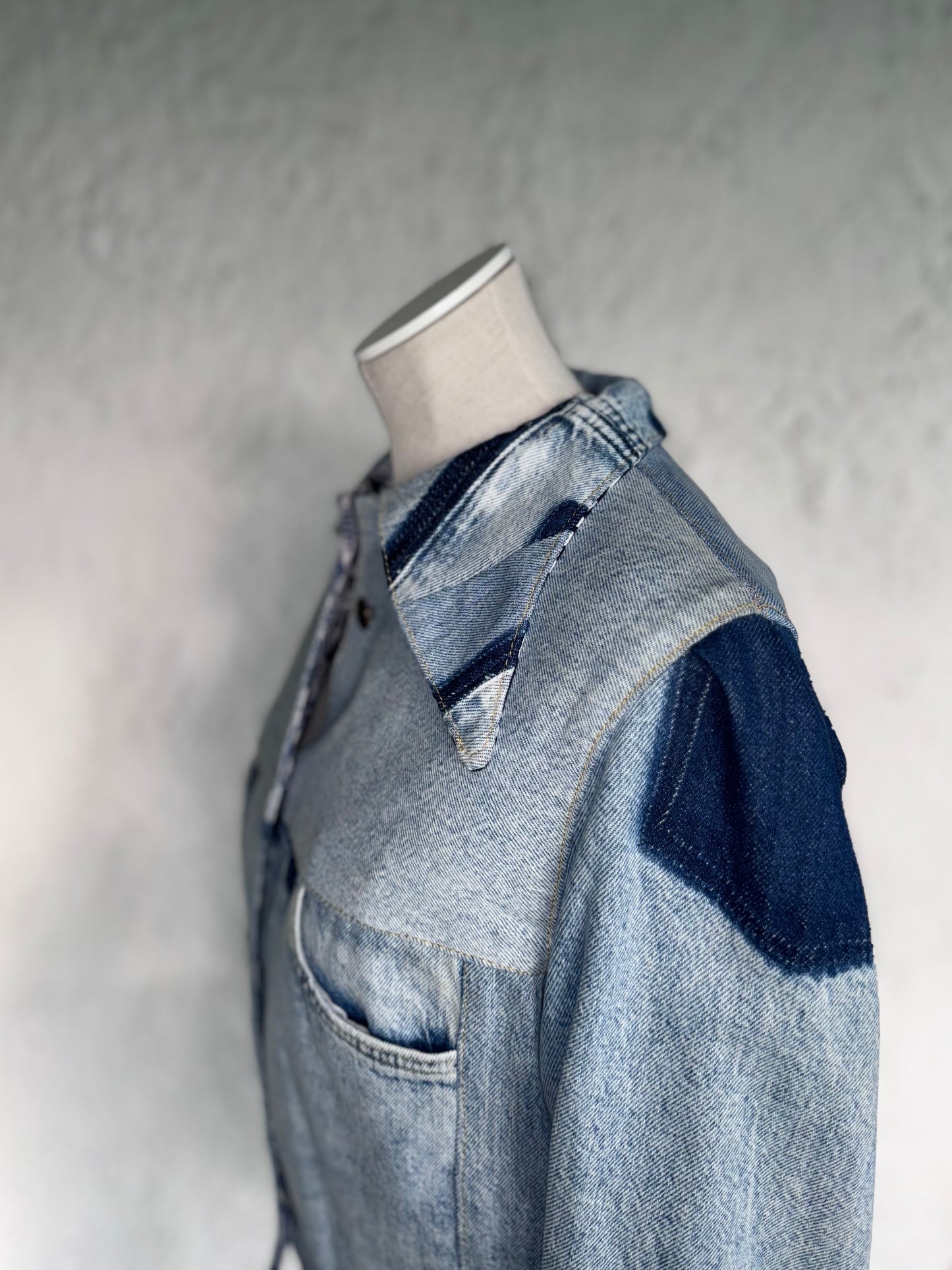 cropped patched denim jacket by KIOKU Studio shoulder close up