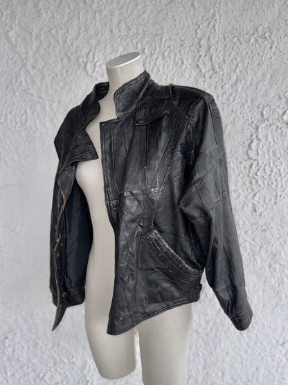 1980s vintage black patchwork leather jacket • esra