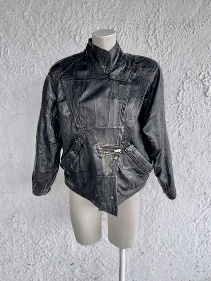 1980s vintage black patchwork leather jacket • esra