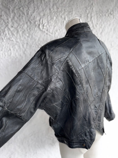 1980s vintage black patchwork leather jacket • esra