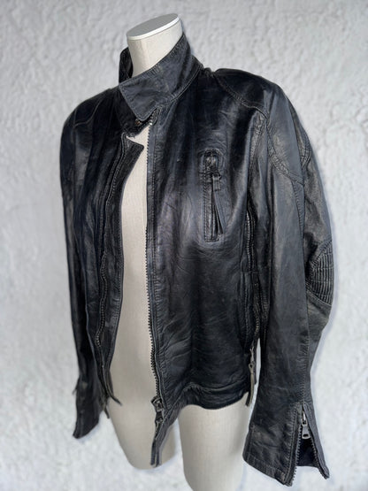 y2k black leather jacket • quintessence
