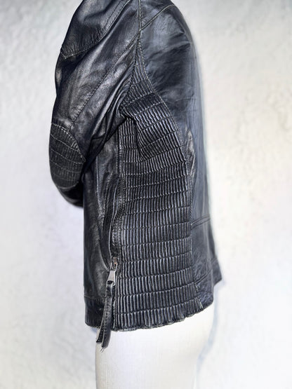 y2k black leather jacket • quintessence